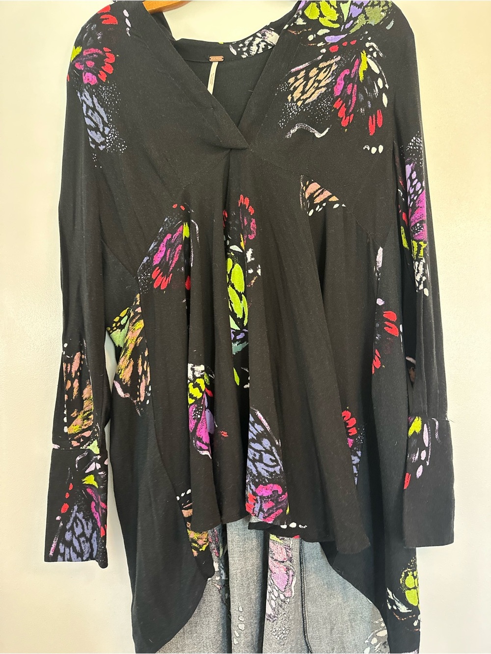 Free People Black V-Neck Top with Subtle Multicolor Print